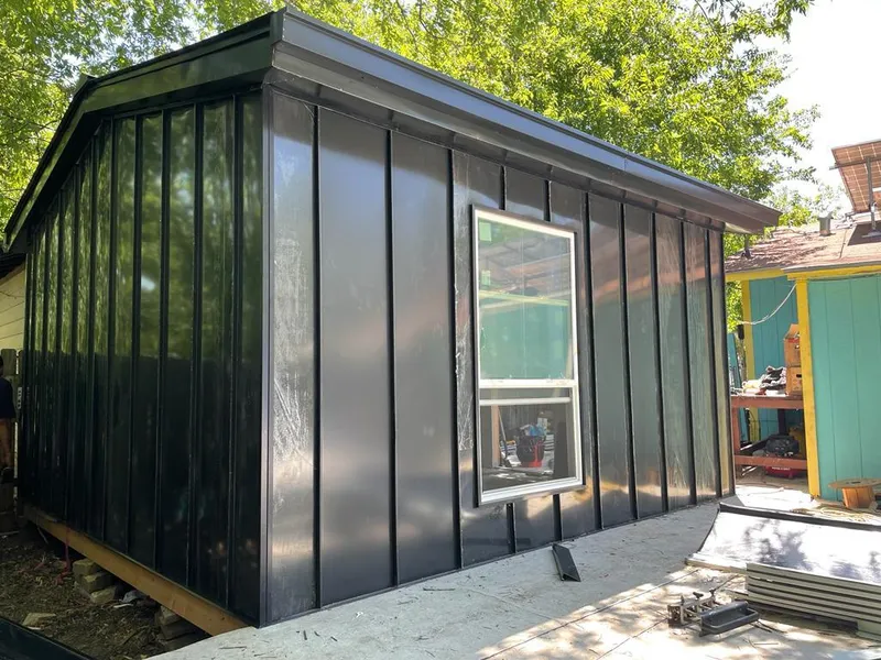 Black standing seam metal wall panels for Metal Roof Installation in Ada